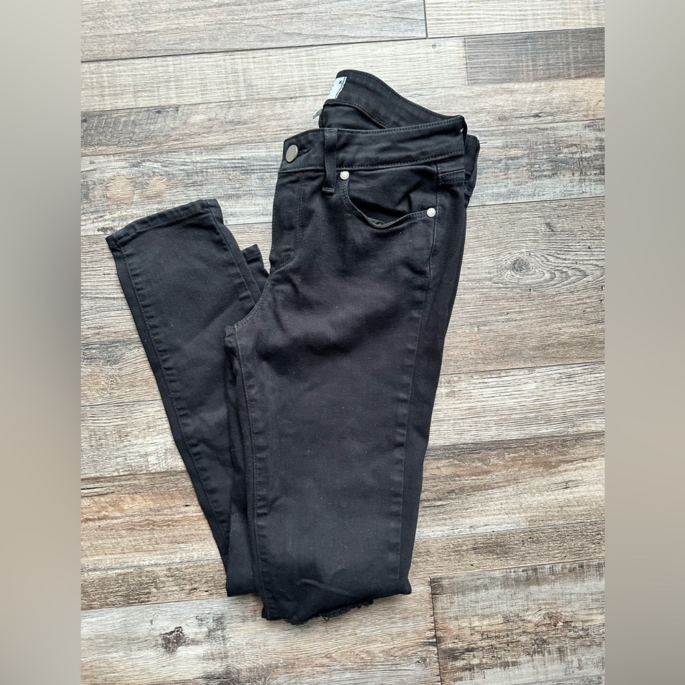 PAIGE  jeans in black with with knee fringe holes on each knee size 28